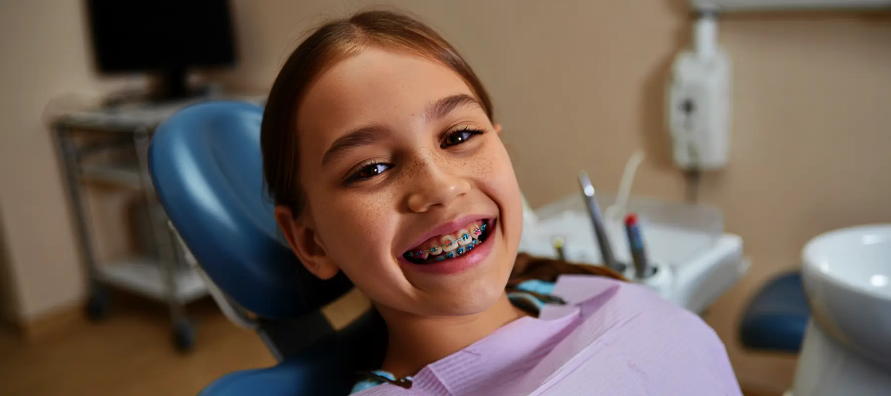 A girl shows off her braces